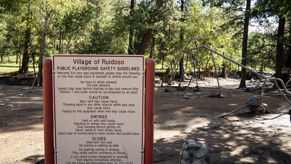 Officials touring flood-damaged areas in Ruidoso, New Mexico, in August 2025